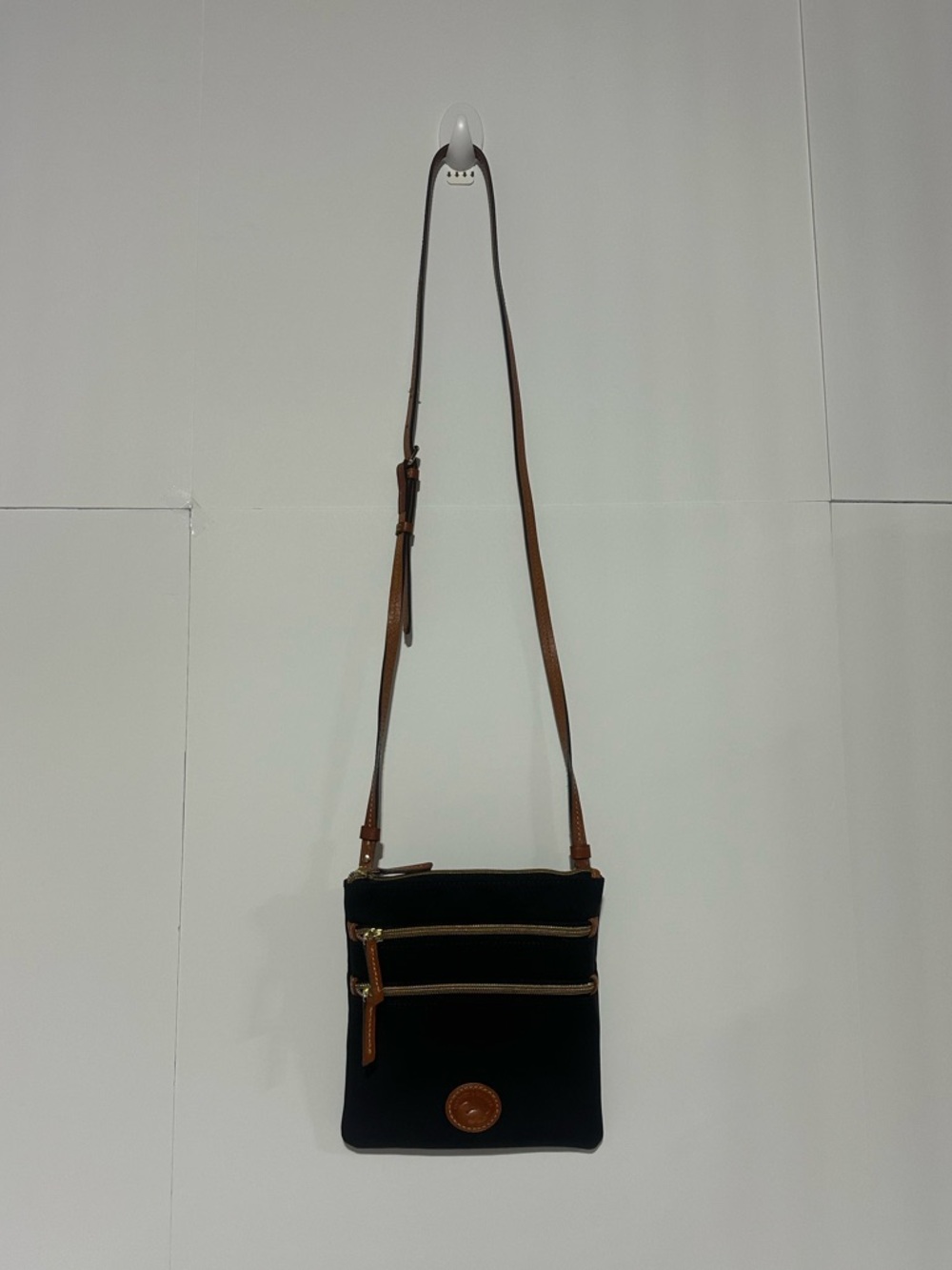 Dooney & Bourke Triple Zip Black Crossbody with Brown Leather Strap